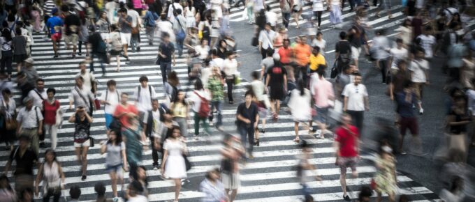 Crowd of people in Japan crossing major street