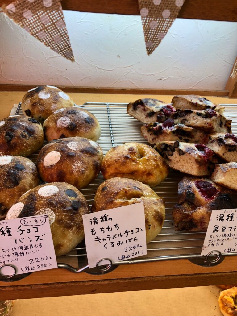 A display of pastries on a rack at the Marche bakery, Kyoto.